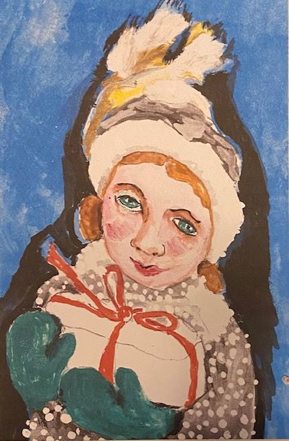 A sweet girl with a shy expression holds a gift in her green mittens. She is wearing a ski hat and has on a fluffy coat.