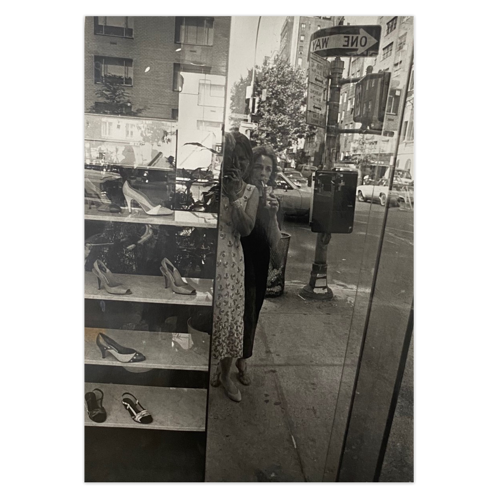 This photography card features a vintage New York street scene from the late 1970's. It shows the reflection of two women, one the photographer, the other, her mother as they look at fancy shoes on Madison Avenue.