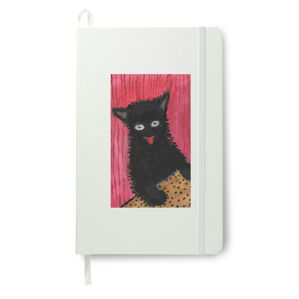 Mock up printed on a white journal which showcases the pop of color the black and deep reds of the image. The cat seems to pop out at you!