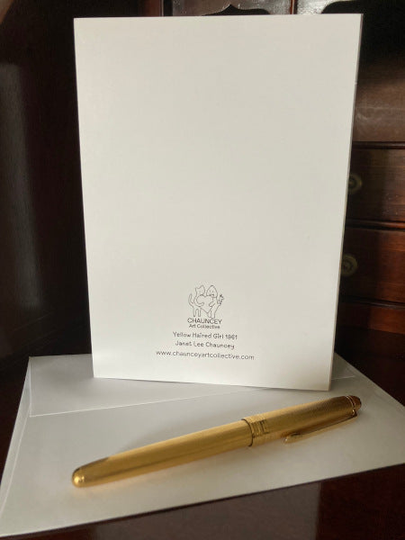 Mockup of the reverse side of the greeting card on a wooden desk with the envelope and a gold pen,