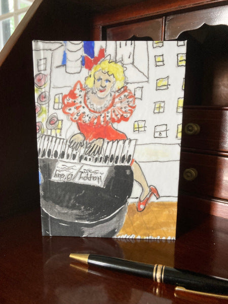 Mock up of All That Jazz journal on a wooden desk.