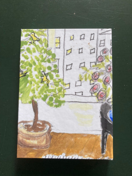The back cover of All That Jazz journal shows a tree with yellow birds and the city in the window.