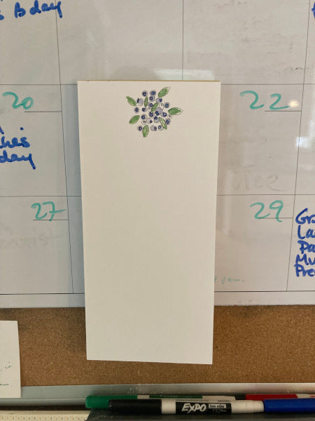 The sweet Blueberries magnetic notepad has a large magnet which adheres to most metal surfaces, adding color and style!