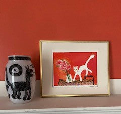 Caspar with Roses Art Print mock up in a room with raspberry colored walls. Reproduction of Janet Lee Chauncey's original artwork.