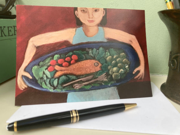 Mockup of Fish Platter Just For You on a white table with a black pen,