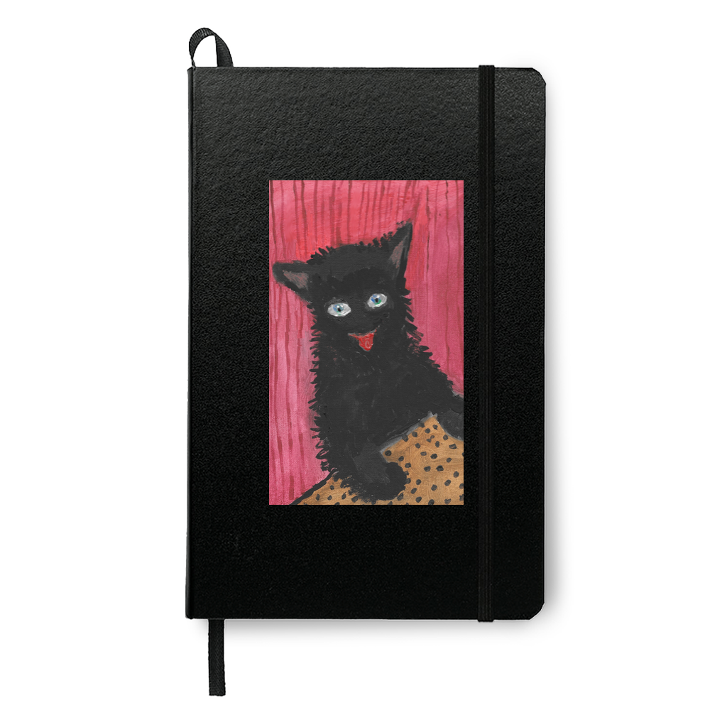 Mock up of the journal printed in black which compliments the color of the cat and accentuates the rich deep red background of the image.