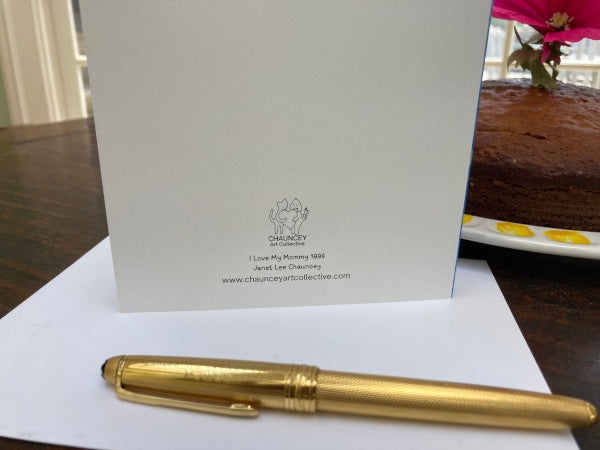 Mock up of the back of the card with the banana cake still visible.