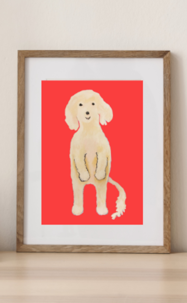 Ollie Stands up art print is in a matted wooden frame. The brightness of the coral background is striking against the white wall. The smiling Maltese dog stands on his hind legs in a friendly greeting.