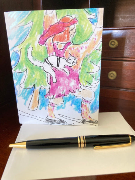 This shows Skiing Caspar adorable Xmas card standing upright on its envelope.
