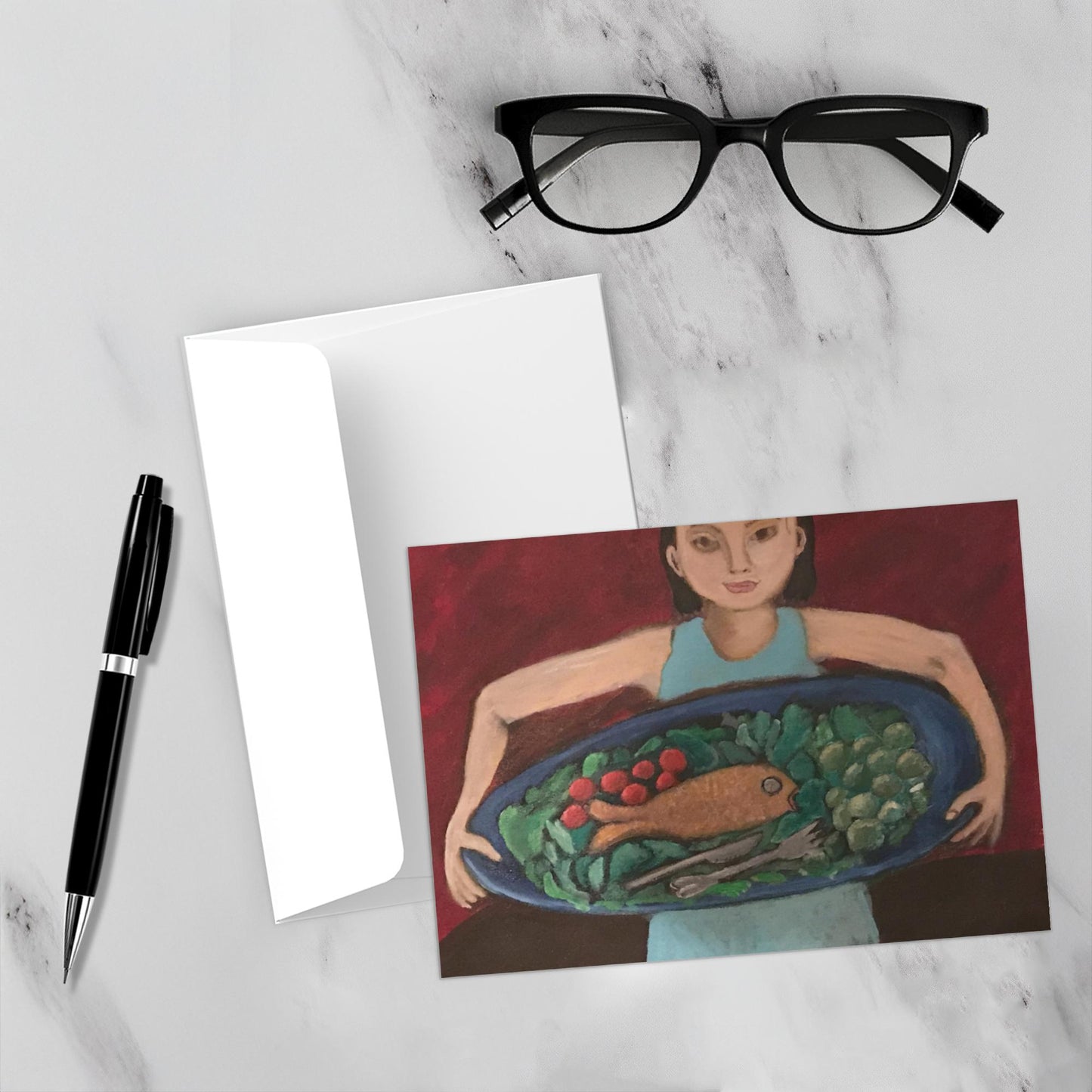 Mock up of the greeting card shown on a white marble backdrop which makes the colors in the card come alive.