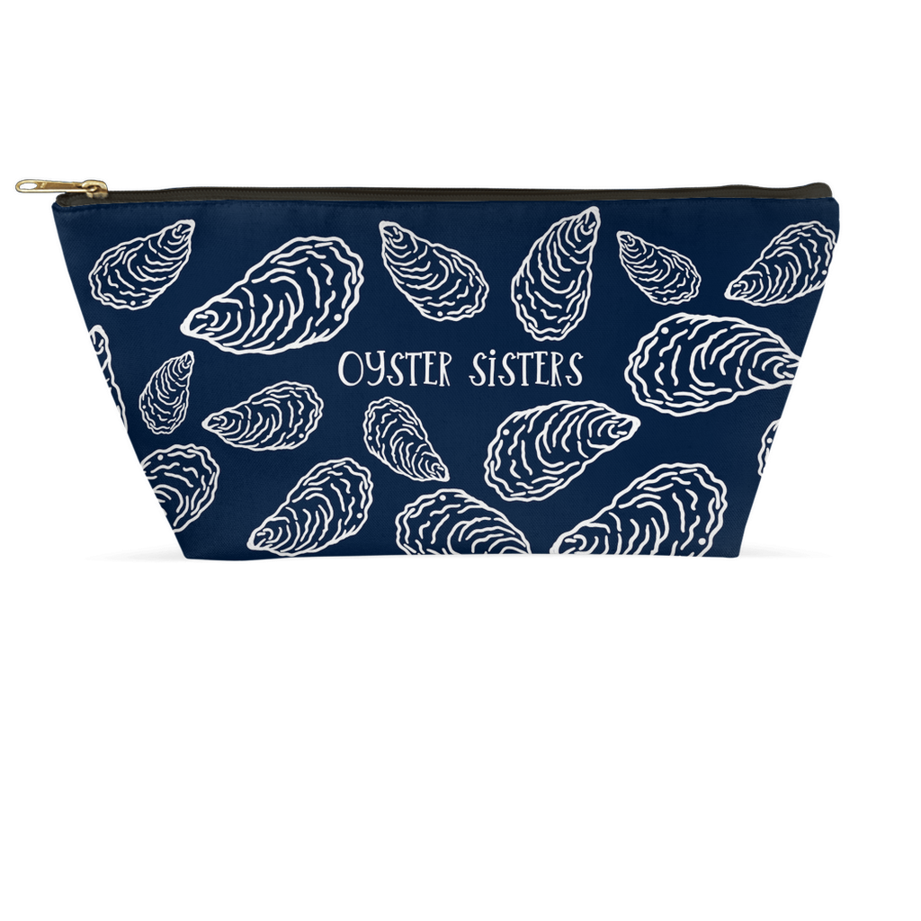 Navy pouch with white oyster shell pattern and Oyster Sisters text.  Artwork by Heidi Chauncey Vorwerk.