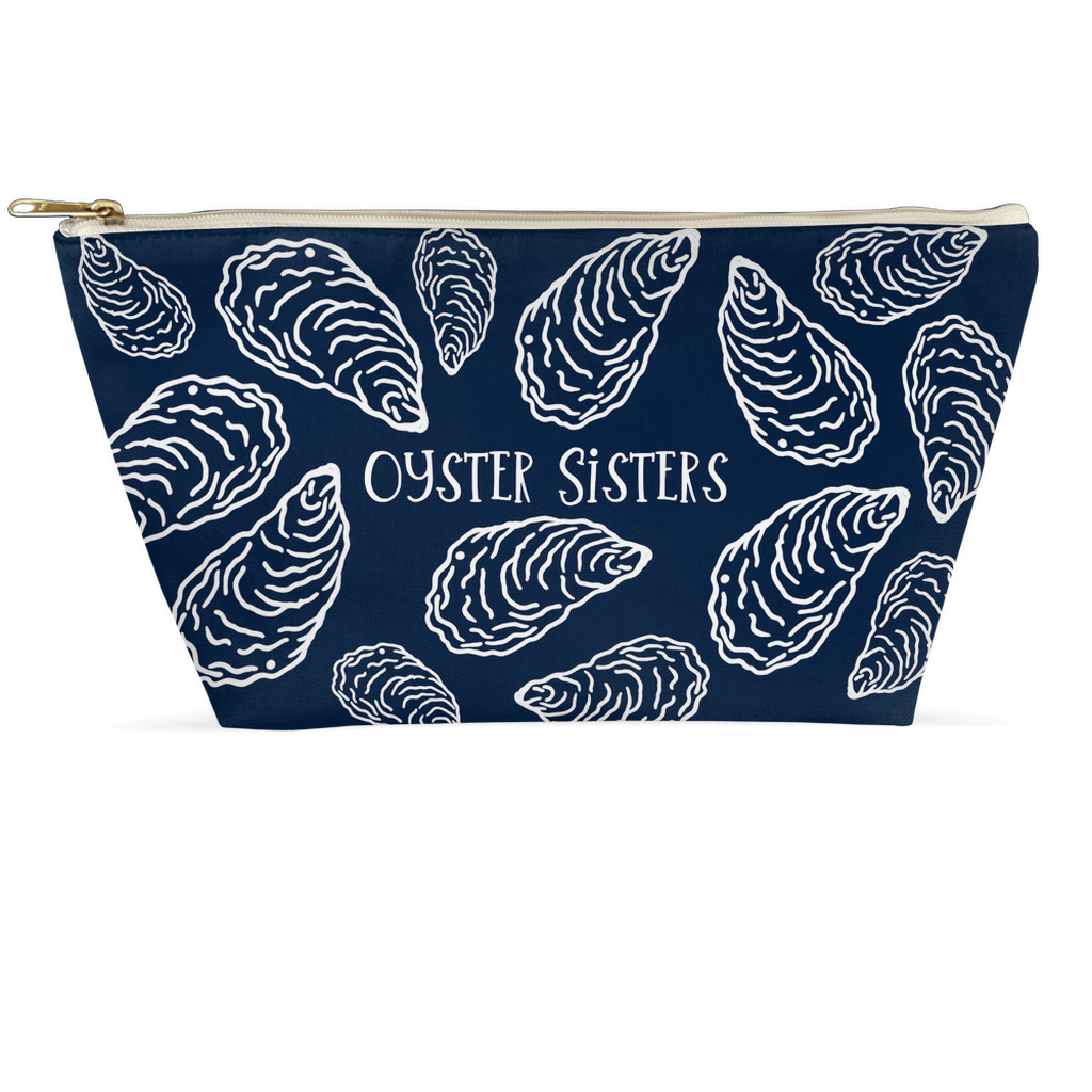 Navy pouch with white oyster shell pattern and Oyster Sisters text on a white background.
