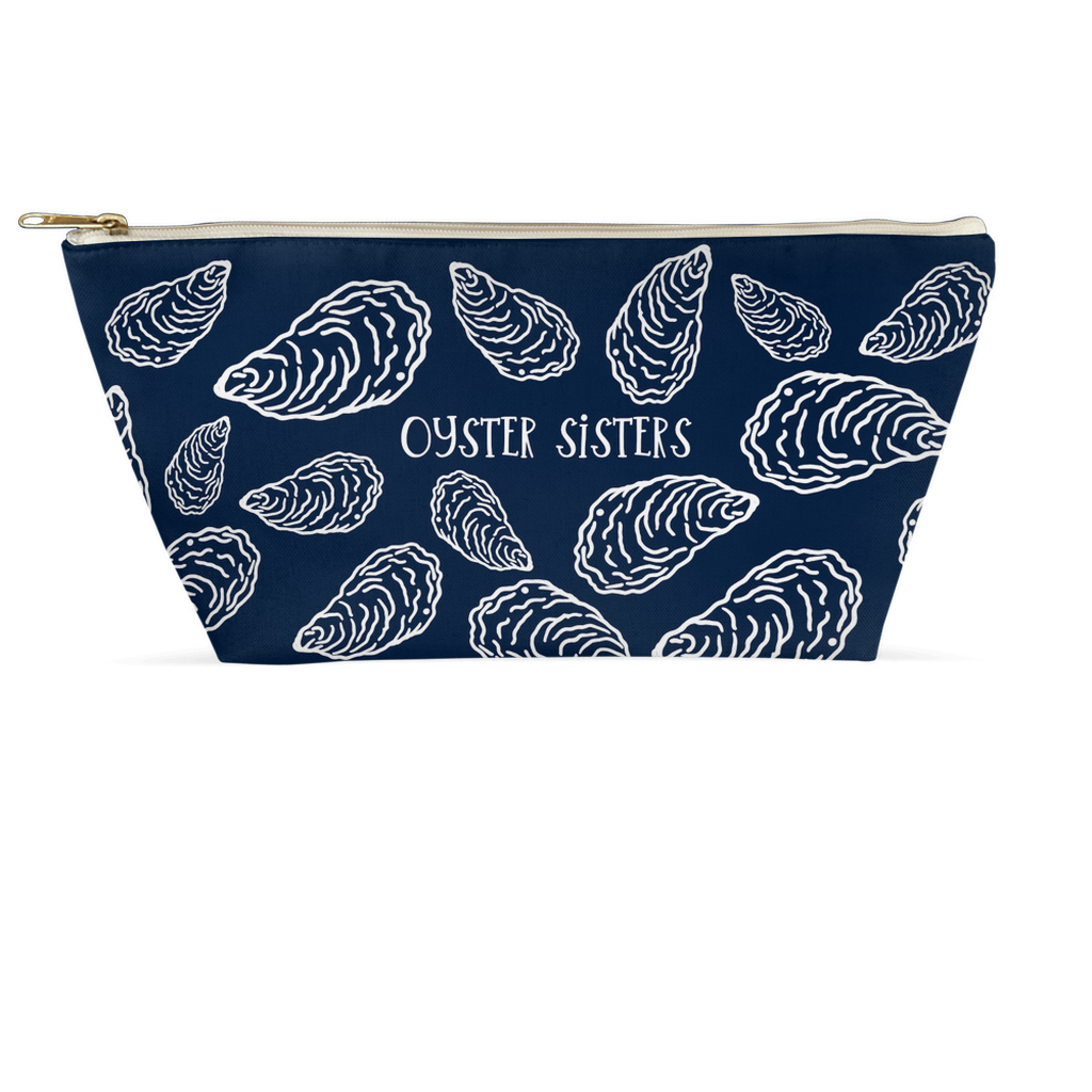 Navy pouch with white oyster shell pattern and Oyster Sisters text on a white background