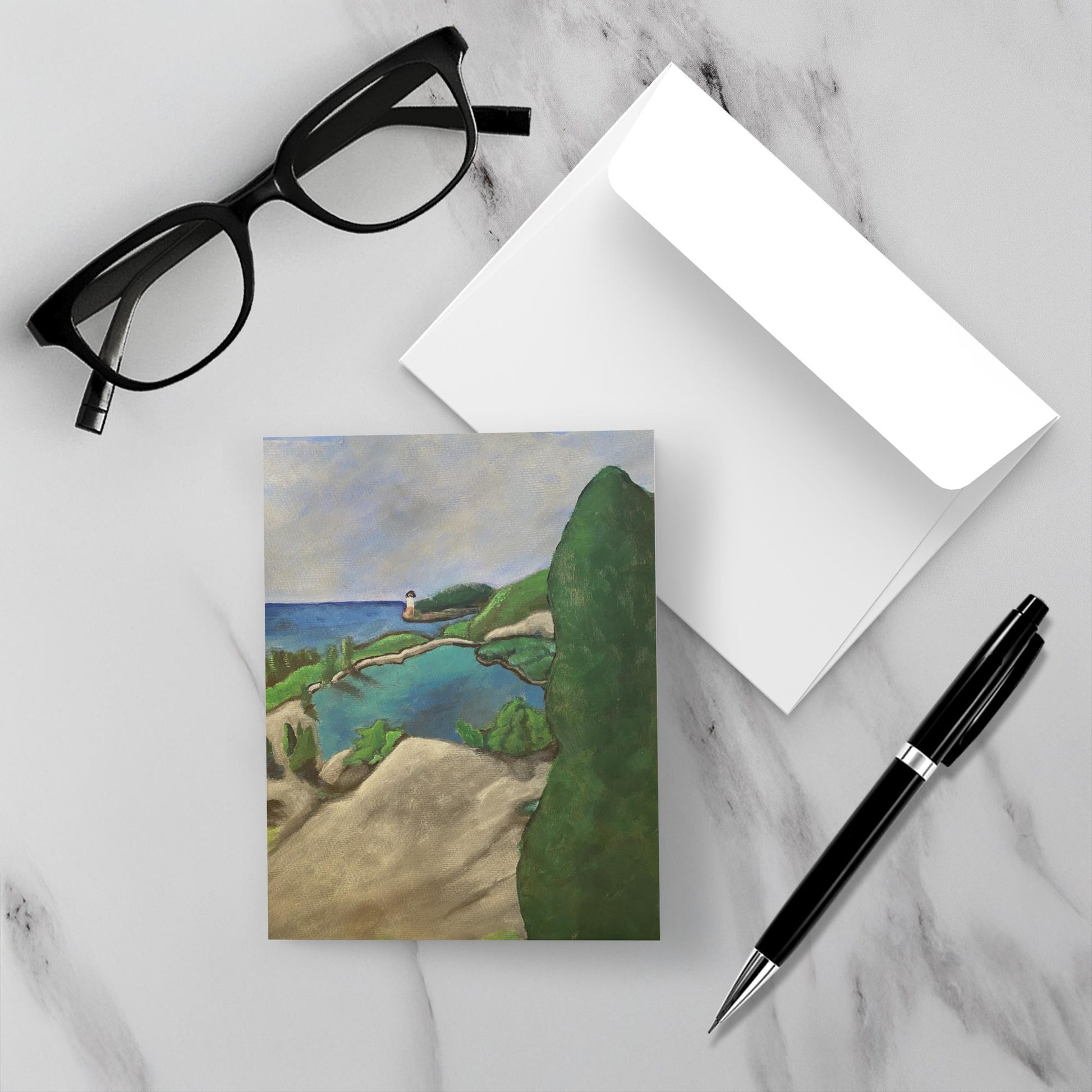 I Can See Clearly greeting card sits on a marble surface next to its envelope a pen and reading glasses.