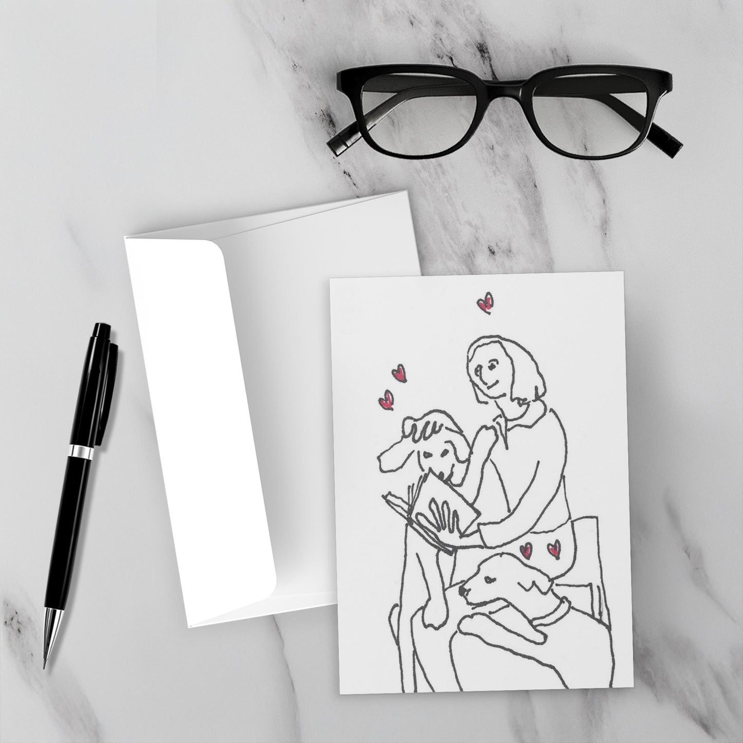 Mock up of the greeting card with its envelope on a marble surface.