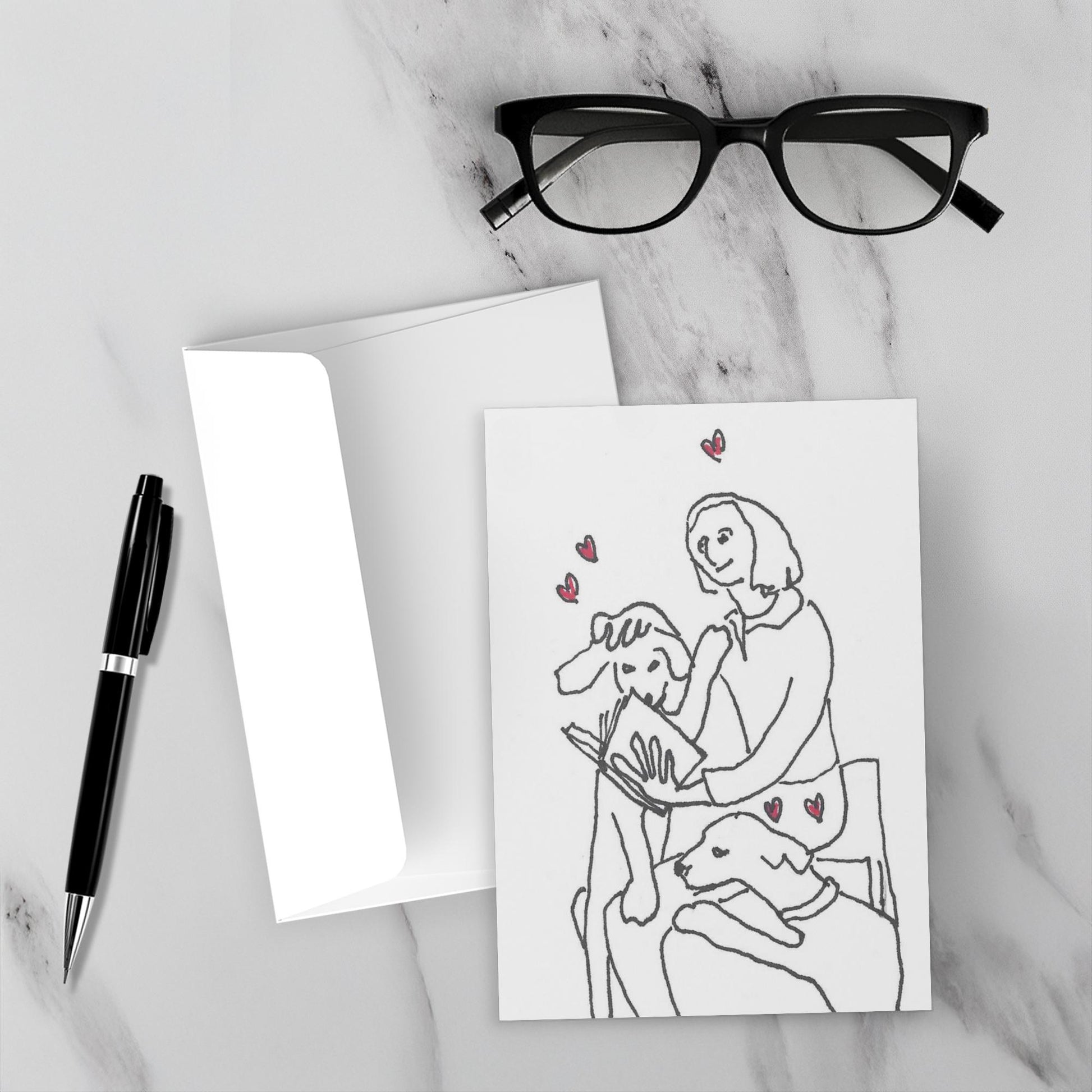 Mock up of the greeting card with its envelope on a marble surface.