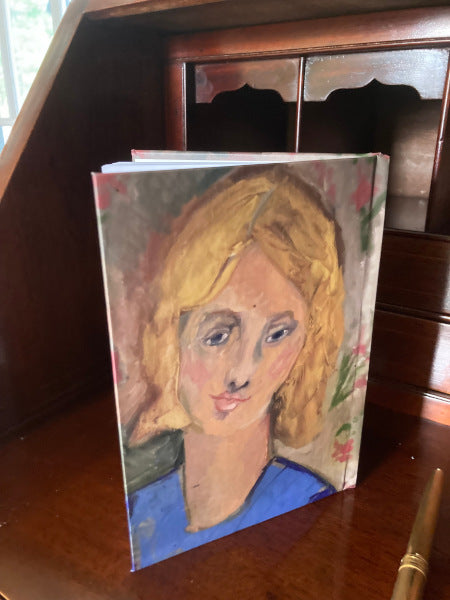 Back cover of Yellow Haired Girl Journal by Chauncey Art Collective.