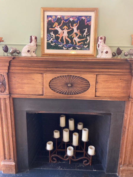 Another mockup over the mantel of the happy scene of River Dance art print.