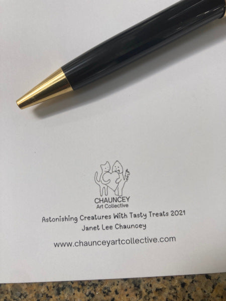 Close up photo of the Chauncey Art Collective Logo and card title on the back of the card