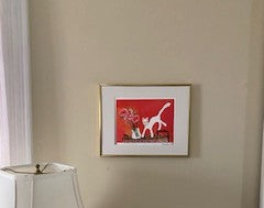 Mock up of Caspar with Roses framed and hanging on beige wall.