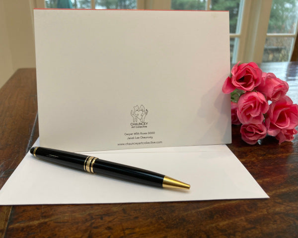 A mock up of the back of the card and the envelope showing the title and the logo,
