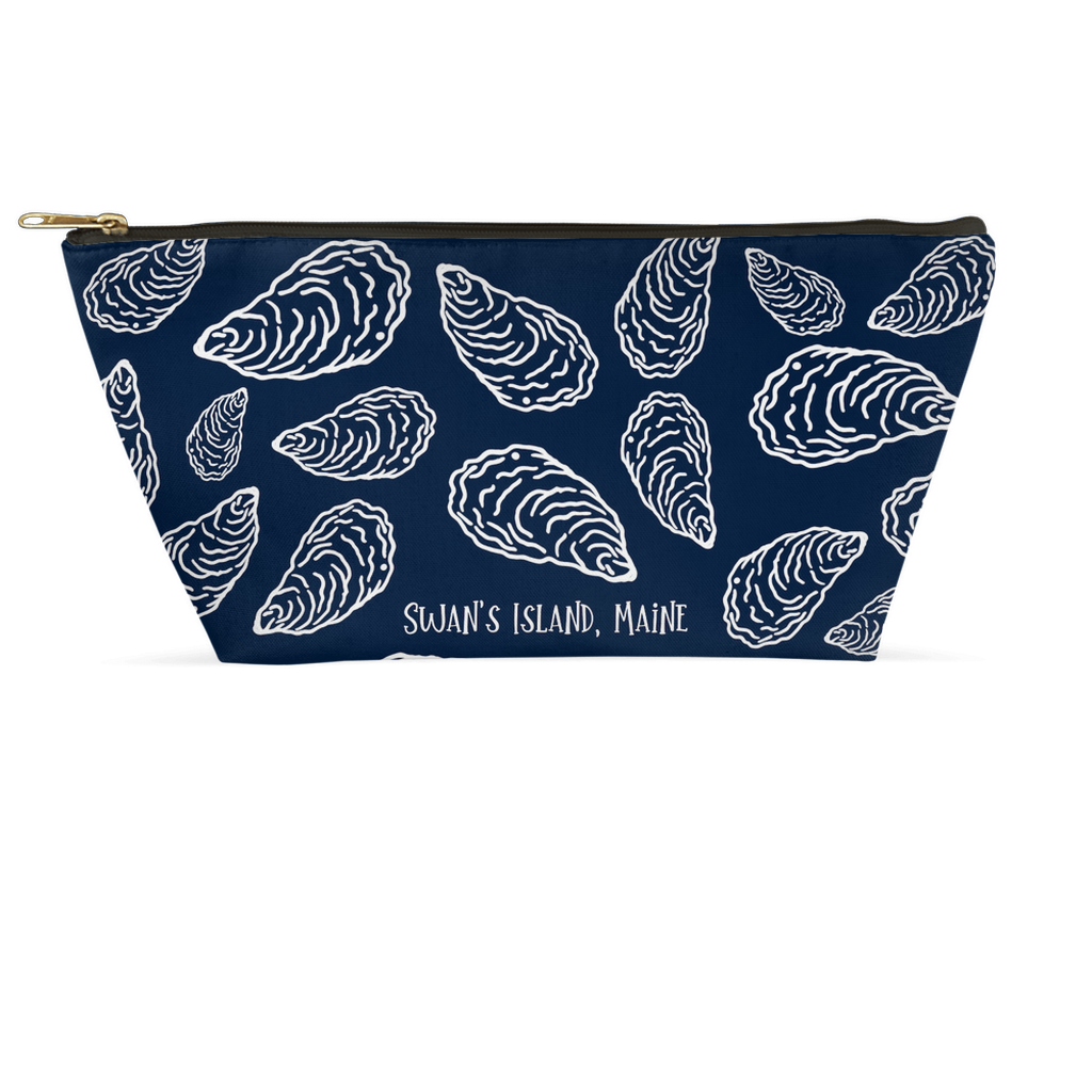 Navy pouch with white oyster shell pattern and Swan's Island, Maine text on a white background.  Product made by Chauncey Art Collective.